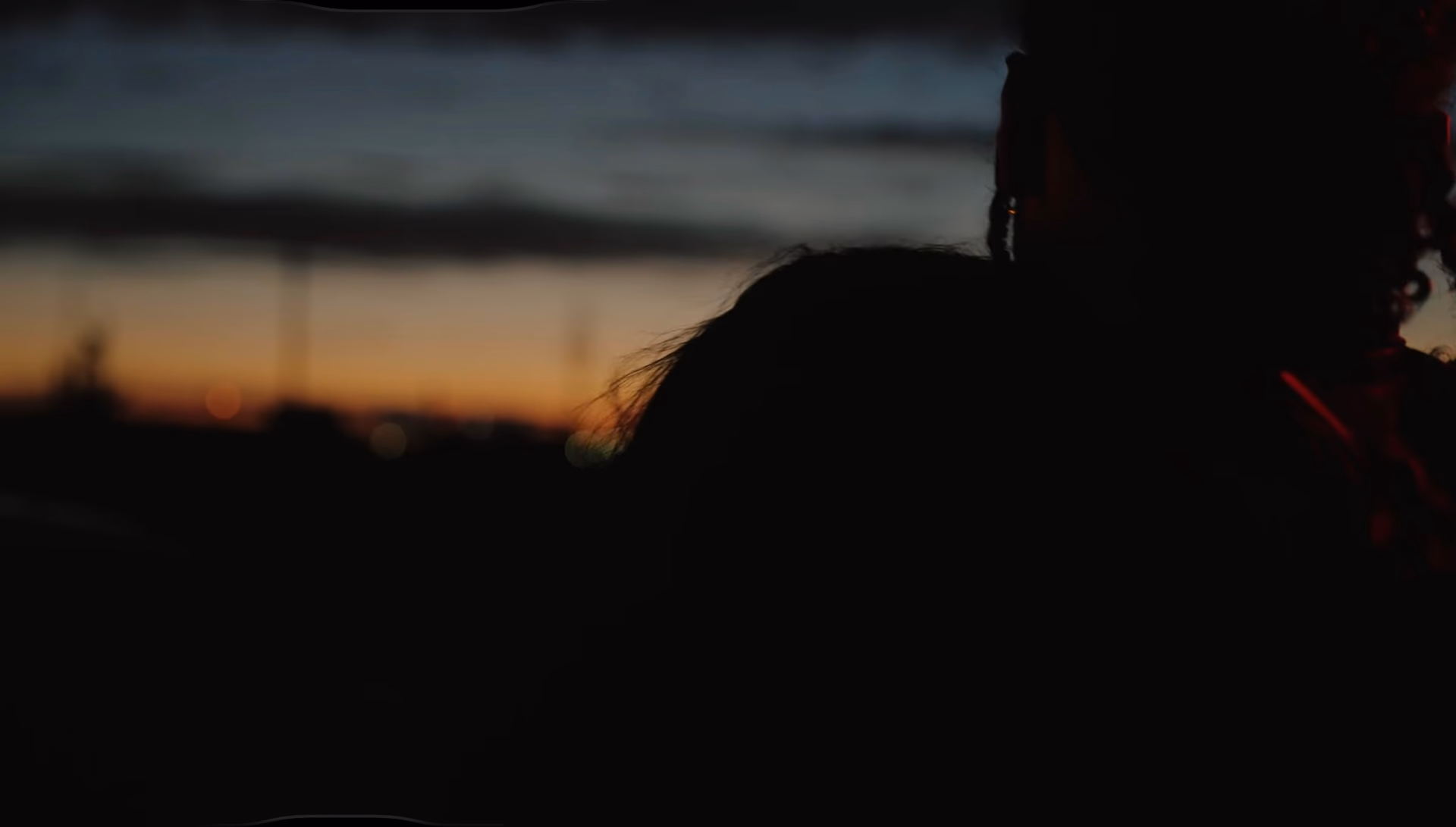 Sunset silhouette with two figures